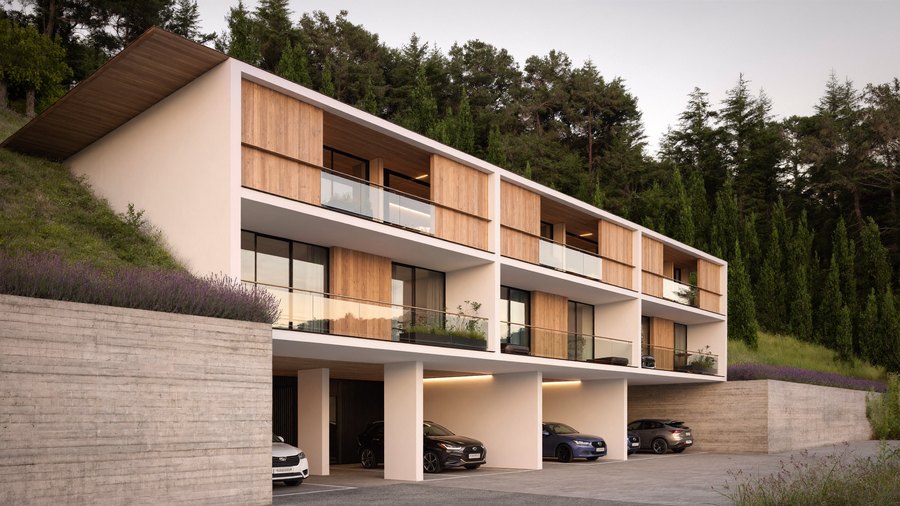 A long three-storey panel bar stepping along a slope